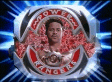 a power rangers logo with a picture of a man in the center