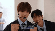 two boys in suits and ties are standing next to each other with one saying i 'll give my all