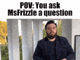 a man with a beard is standing in front of a sign that says pov you ask msfrizzle a question .