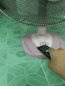 My Fan Is Close With Remote Thumbs Up GIF - My Fan Is Close With Remote Thumbs Up Okay GIFs