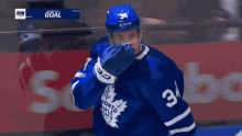 a toronto maple leafs hockey player wearing number 34