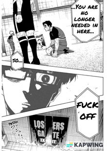 a man is kneeling down in front of a sign that says losers gate exit
