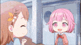 two anime girls are standing next to each other in a hallway and talking .
