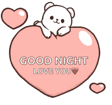 a teddy bear is laying on top of a pink heart .