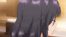 a close up of a woman 's hair with a purple fringe