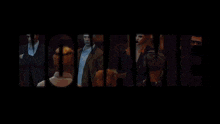 a group of people are standing around a pool with the word morte written in the background