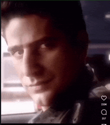 a close up of a man 's face with the number 257 on the bottom right