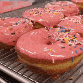 Pink Donut Sprinkles GIF - Pink Donut Sprinkles Pink Frosting Donut GIFs