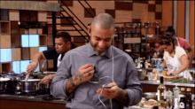 Henrique Fogaça GIF - Master Chef Head Bang Listening To Music GIFs