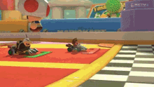 two mario kart characters are racing on a checkered race track