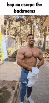 a very muscular man is holding a towel and smiling while standing on a sidewalk .