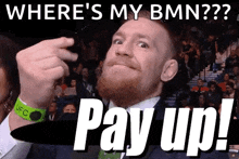a man with a beard is making a funny face with the words pay up written below him