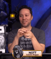 a man wearing a shirt that says " how do you want to do this "