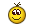 a close up of a yellow smiley face with antlers and a surprised expression .