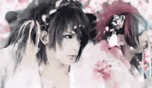 a couple of anime characters standing next to each other . one of the characters is wearing a crown of flowers on her head .