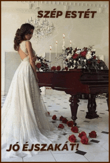 a woman in a white dress is standing in front of a piano with roses on the floor