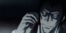a man in a suit is talking on a cellphone