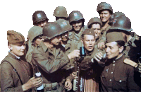 a group of soldiers are gathered around a man playing an accordion and drinking beer