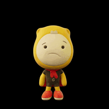 a yellow stuffed animal with a red cape and the words please written above it