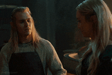 a man and a woman are standing next to each other and the words spice & rabbit are on the bottom right