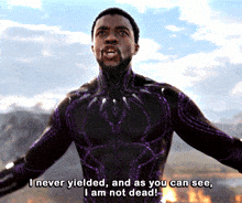 a man in a purple suit says " i never yielded and as you can see , i am not dead "