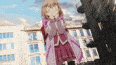a girl in a pink and white dress stands in front of a building