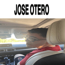 a man in a car with the name jose otero on the top