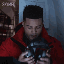 Putting On Headphones Bodie GIF - Putting On Headphones Bodie Skymed GIFs