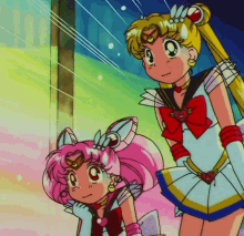 sailor moon and chibi moon are standing next to each other in a cartoon