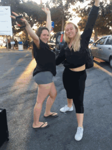 Two Girls Posing GIF