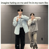 two men are standing next to each other with a caption that says imagine hating on me and i 'm in my room like