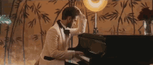 Piano Musician GIF - Piano Musician Thinking GIFs