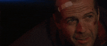 a man with a bandage on his forehead says " yippee ki yay mother fcker "