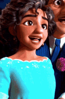a woman in a blue dress is standing next to a man in a suit