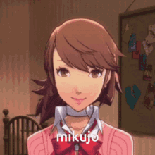 a girl in a pink sweater with the word mikujo on her chest