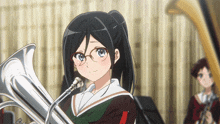 a girl wearing glasses is holding a trumpet