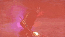 a man is holding a gun in front of a huge fireball