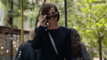 Checking Out With Sunglasses GIF - Miriam Shor Diana Trout Younger Tv GIFs