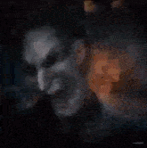 a collage of images of a clown 's face on a black background