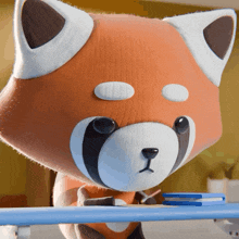 a cartoon fox is sitting at a table with a book and a pen