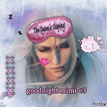 a picture of a woman wearing a pink sleep mask that says the queen is sleeping