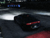 a dodge charger is parked on a concrete surface
