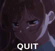 a girl with tears in her eyes and the word quit in the corner