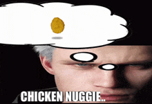 a man thinking about a chicken nugget with a thought bubble above his head that says chicken nuggie