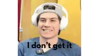 a man wearing headphones with the words i don 't get it below him