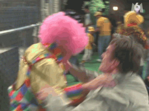 Punch Hal GIF - Punch Hal Clown - Discover & Share GIFs