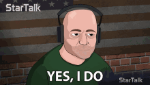 a man wearing headphones says yes i do in front of an american flag