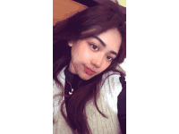 a woman with long hair is taking a selfie