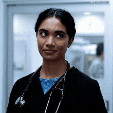 a woman with a stethoscope around her neck has the hashtag bestofsupra on the bottom