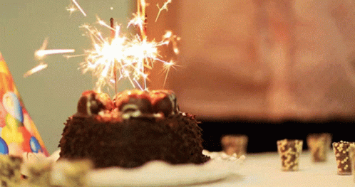 Happy Birthday cake with sparklers, gift | Stock Video | Pond5